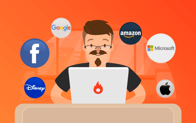 Strong brand - In the image, a man is front of a laptop with several known brands around it.